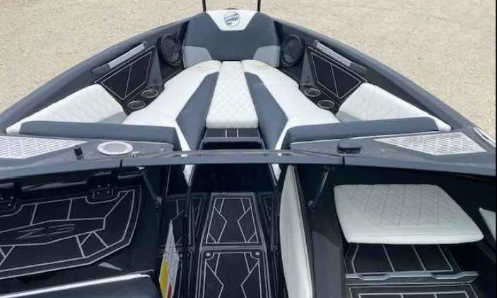 Slide: The Image of 2024 Tigé Z5 boat interior with modern seating and sleek design. - 8