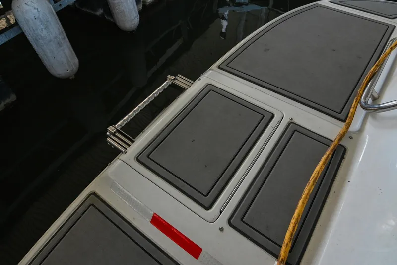 Slide: The Image of 2004 Cobalt 360 boat deck with swim platform and ladder. - 19