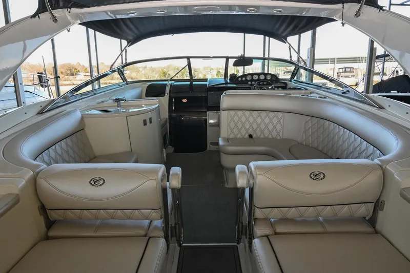 Slide: The Image of Luxurious interior of a 2004 Cobalt 360 boat with plush seating and elegant design. - 23