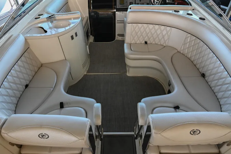 Slide: The Image of Luxurious interior of a 2004 Cobalt 360 boat with plush seating and elegant design. - 24