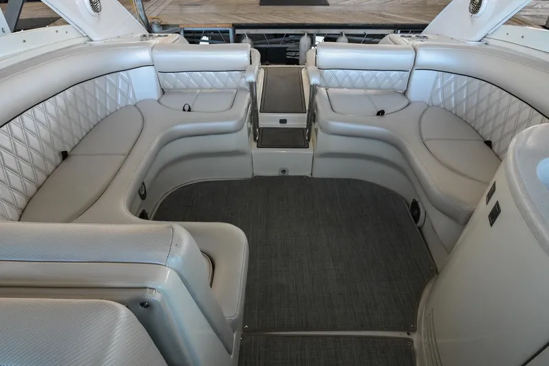 Slide: The Image of Luxurious interior of a 2004 Cobalt 360 boat with plush seating and elegant design. - 25