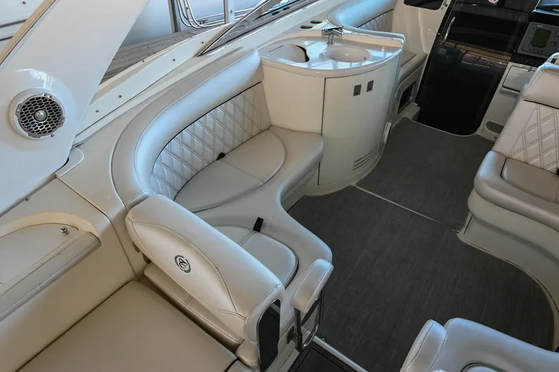 Slide: The Image of Luxurious interior of a 2004 Cobalt 360 boat with plush seating and elegant design. - 26