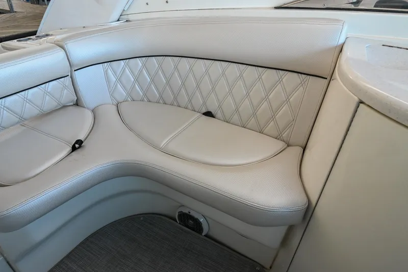 Slide: The Image of Luxurious seating in 2004 Cobalt 360 boat with diamond-stitched upholstery. - 30