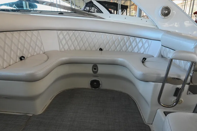 Slide: The Image of Luxurious interior seating of a 2004 Cobalt 360 boat with quilted upholstery. - 33