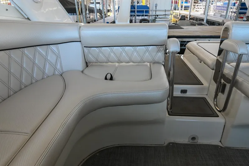 Slide: The Image of Luxurious seating on a 2004 Cobalt 360 boat with quilted upholstery. - 34