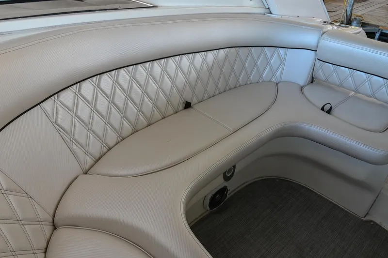 Slide: The Image of Luxurious seating in a 2004 Cobalt 360 boat with diamond-stitched upholstery. - 37