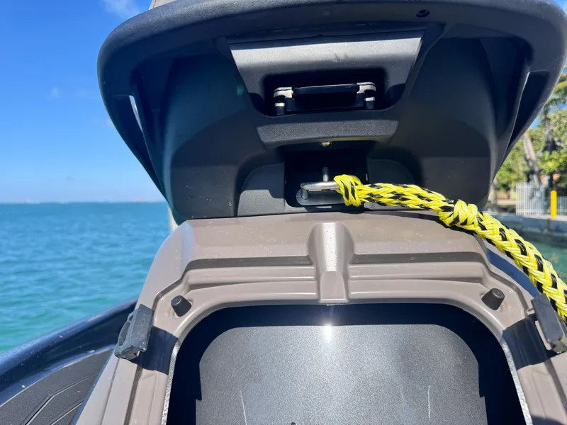 Slide: The Image of 2023 Yamaha WaveRunner FX Cruiser H/O with rope, near ocean on a sunny day. - 6