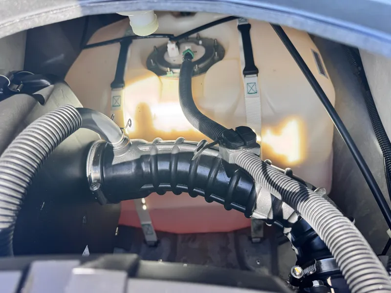 Slide: The Image of 2023 Yamaha WaveRunner FX Cruiser H/O engine compartment with visible hoses and components. - 9