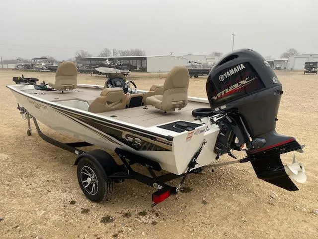 Slide: The Image of 2024 G3 Sportsman 1710 boat with Yamaha outboard motor, parked on a trailer. - 3