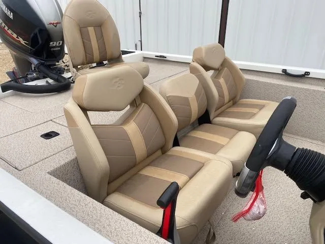 Slide: The Image of 2024 G3 Sportsman 1710 boat interior with beige seats and Yamaha motor. - 7