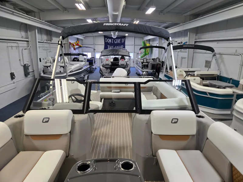 Slide: The Image of 2025 Princecraft Vectra 23 WRL pontoon boat interior in showroom setting. - 14