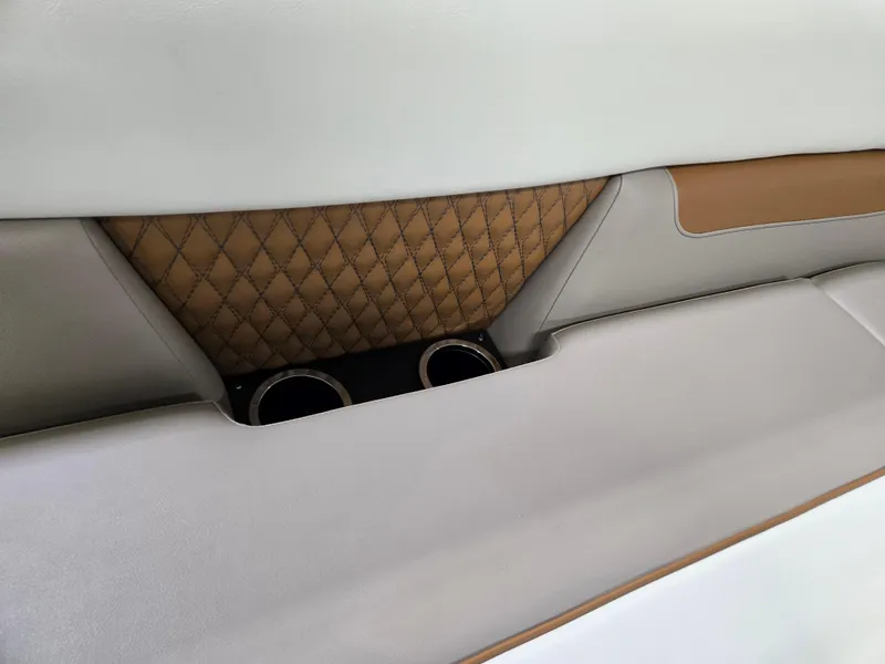 Slide: The Image of Interior seating detail of 2025 Princecraft Vectra 23 WRL with quilted design and cup holders. - 18