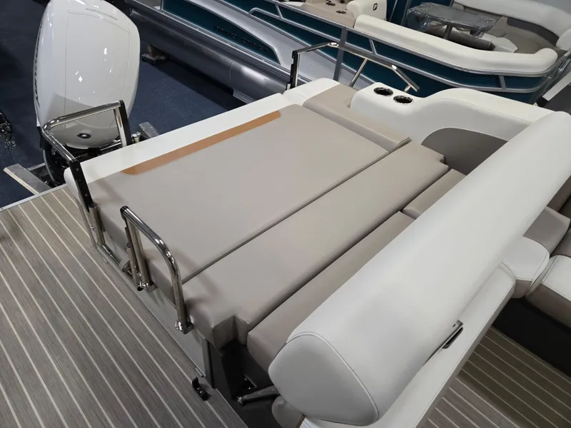 Slide: The Image of Princecraft Vectra 23 WRL 2025 boat interior with cushioned seating and outboard motor. - 8