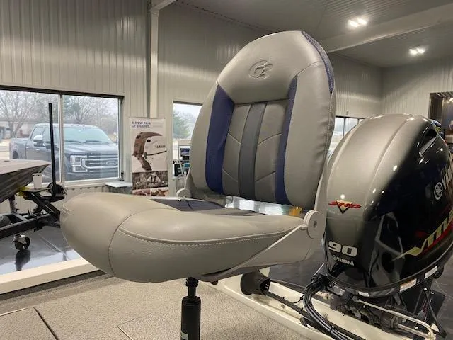 Slide: The Image of 2024 G3 Sportsman 1710 boat seat and Yamaha 90 engine in showroom. - 6