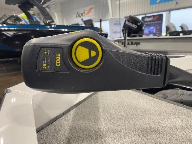 Slide: The Image of Close-up of a 2024 G3 Sportsman 1710 boat control handle in a showroom. - 7