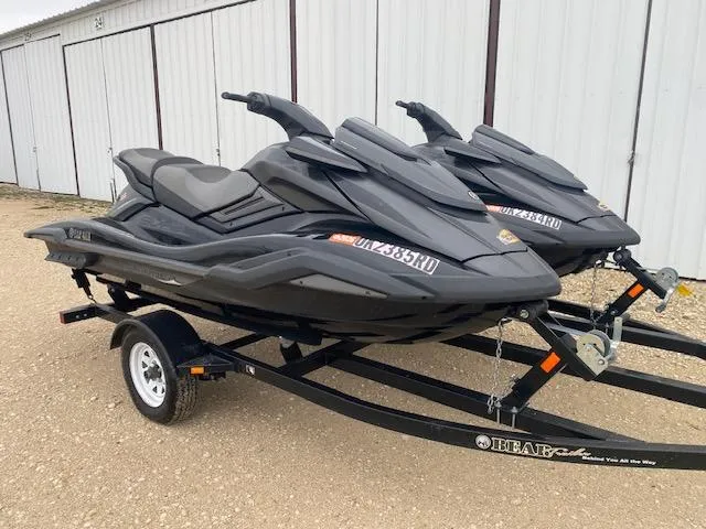 Slide: The Image of Two 2020 Yamaha WaveRunner FX Cruiser SVHO jet skis on a trailer. - 1