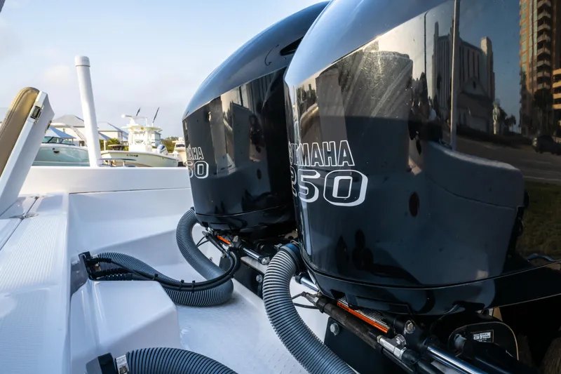 Slide: The Image of Overhead view of 2019 Everglades 273CC boat with beige seating and white deck. - 20