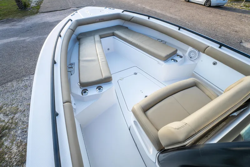 Slide: The Image of 2019 Everglades 273CC boat with dual engines and cushioned seating. - 24