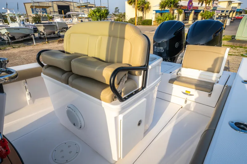 Slide: The Image of 2019 Everglades 273CC boat interior with helm and seating, showcasing modern design. - 31