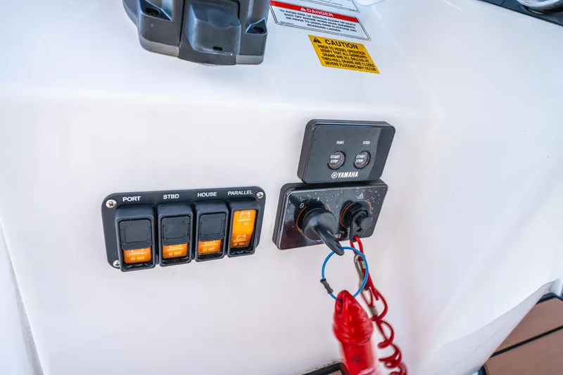 Slide: The Image of 2019 Everglades 273CC boat interior with mounted fire extinguisher. - 45