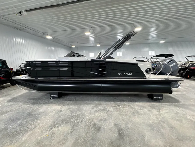 Slide: The Image of 2024 Sylvan G3 CLZ DC pontoon boat in a showroom, side view. - 7