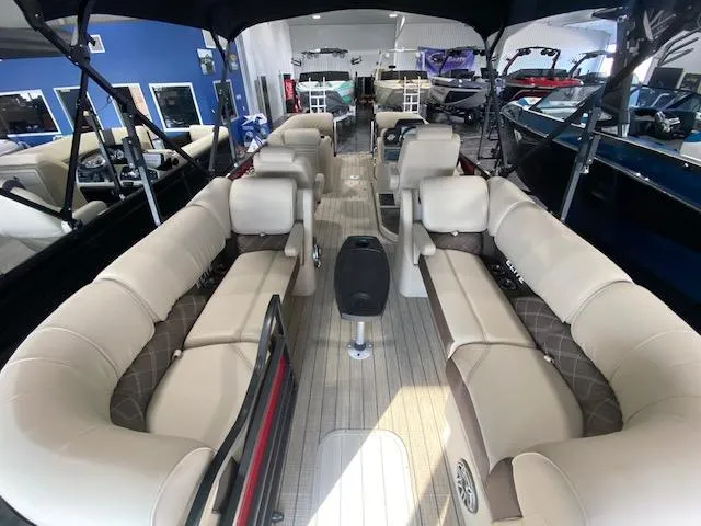 Slide: The Image of Interior of 2025 SunCatcher Elite 324 RC pontoon boat with luxurious seating. - 4
