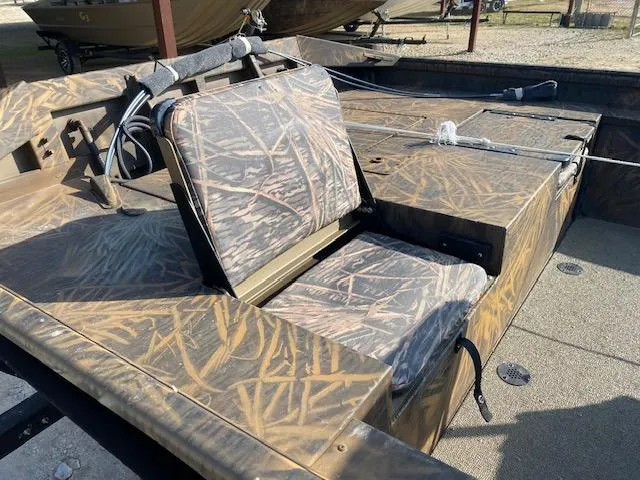 Slide: The Image of 2025 G3 Gator Tough 18 CCJ boat with camouflage seating and deck. - 4