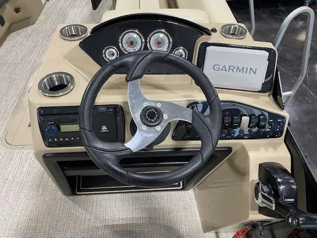 Slide: The Image of Steering console of 2025 SunCatcher Select 322RF with Garmin navigation system. - 8