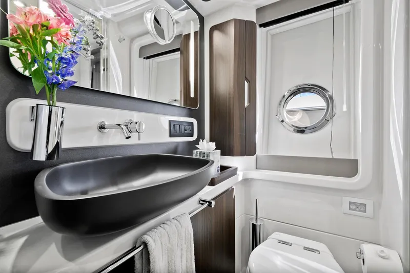 Slide: The Image of Luxurious bathroom interior of 2019 Azimut 50 Flybridge yacht with modern fixtures. - 17
