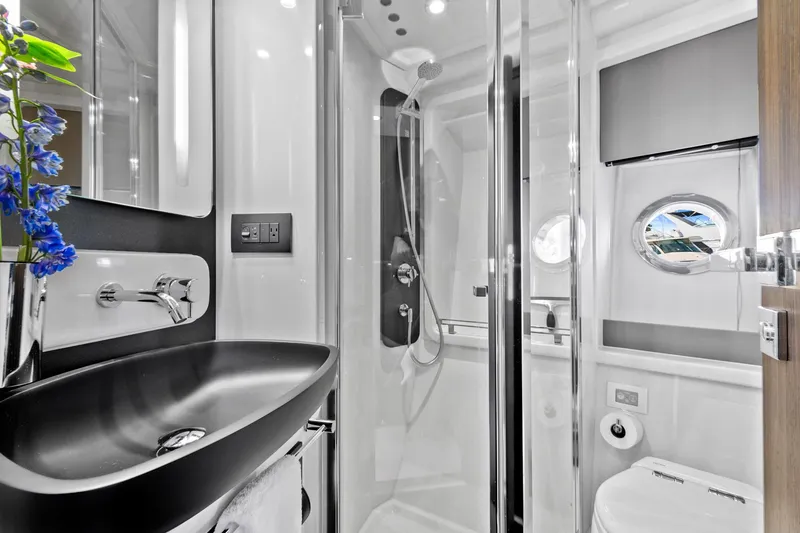 Slide: The Image of Luxurious bathroom in 2019 Azimut 50 Flybridge yacht with modern fixtures and sleek design. - 23