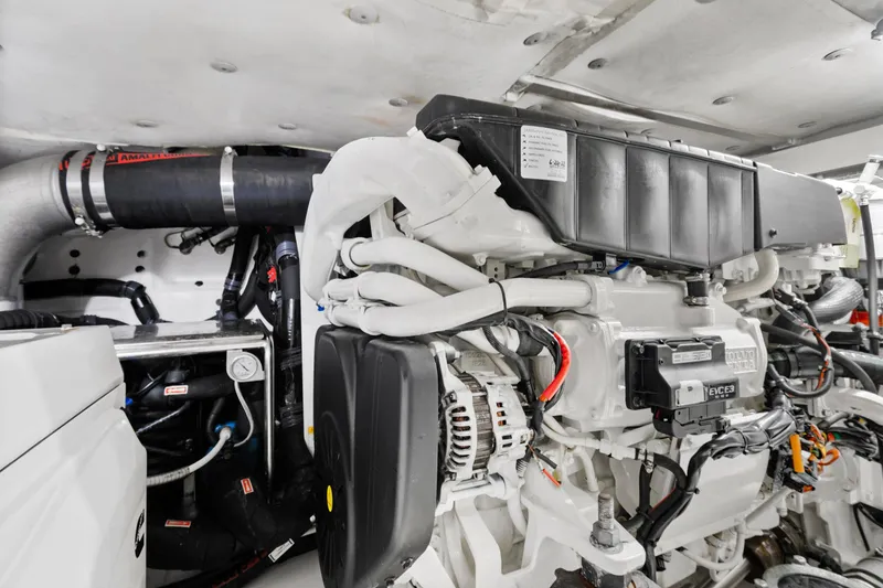 Slide: The Image of Engine room of 2019 Azimut 50 Flybridge yacht, showcasing detailed mechanical components. - 44