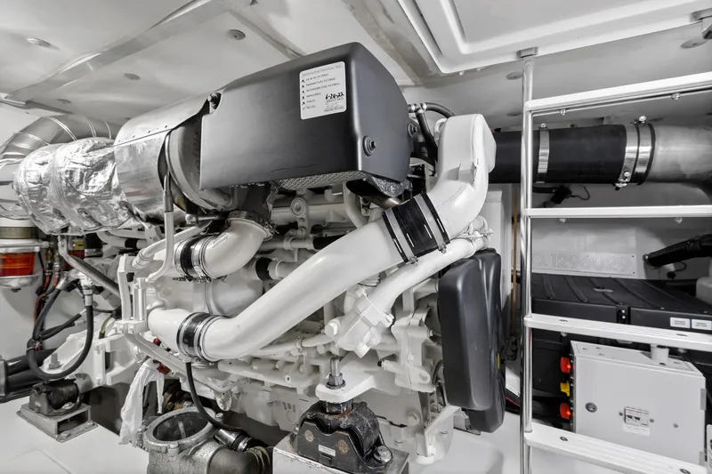Slide: The Image of Engine room of 2019 Azimut 50 Flybridge yacht, showcasing modern machinery and components. - 46