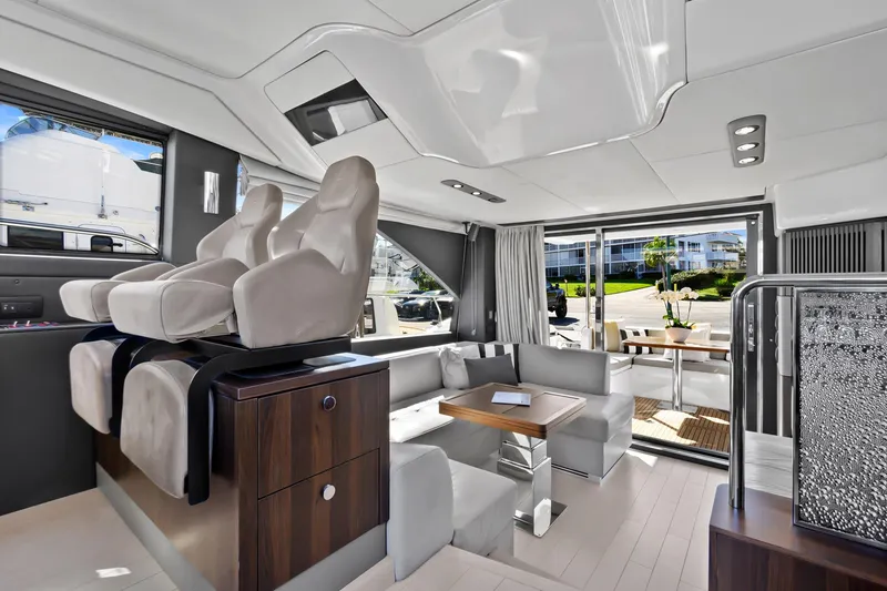 Slide: The Image of Luxurious interior of 2019 Azimut 50 Flybridge yacht with modern seating and elegant design. - 8