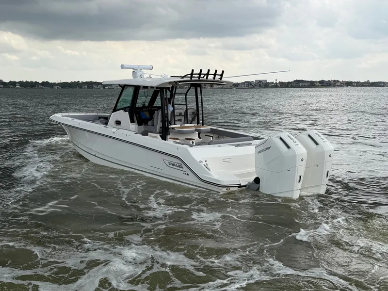 Slide: The Image of 2026 Boston Whaler 360 Outrage on choppy waters. - 11