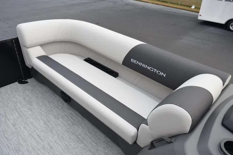 Slide: The Image of 2025 Bennington 21 SL boat interior with gray and white seating. - 10