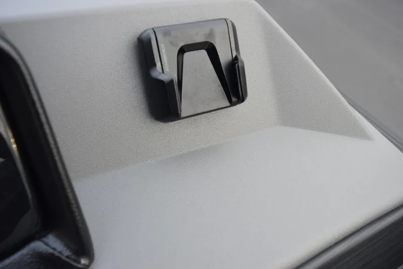 Slide: The Image of Dashboard detail of 2025 Bennington 21 SL boat, featuring a sleek, modern design. - 16