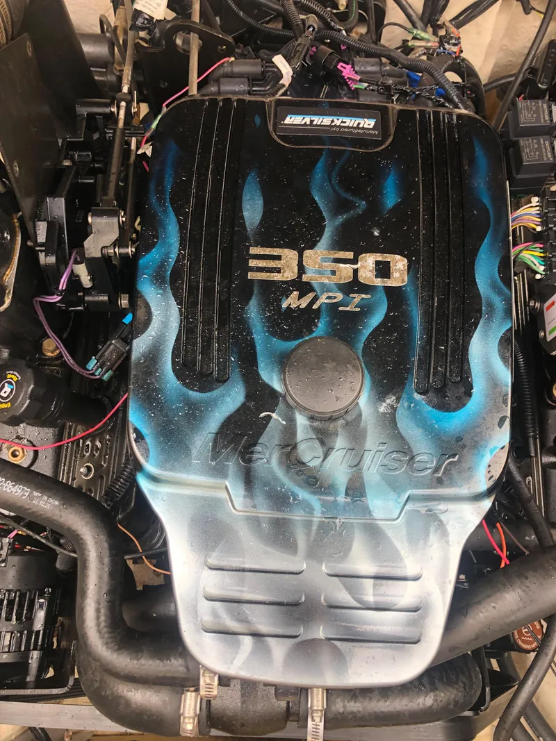 Slide: The Image of 2007 Sea Ray 240 Sundancer engine, 350 MPI, with custom flame design. - 12