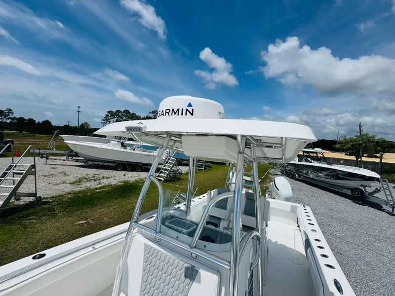 Slide: The Image of 2022 Twin Vee 310 CC GF Classic boat with Garmin equipment under a blue sky. - 20
