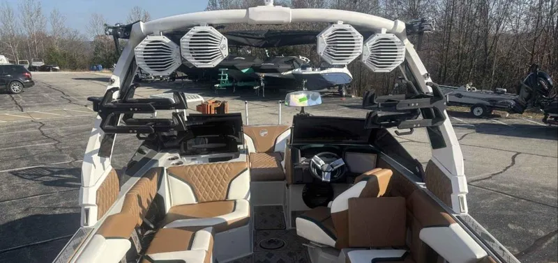 Slide: The Image of 2024 Tigé 22RZX boat interior with premium seating and advanced audio system. - 4