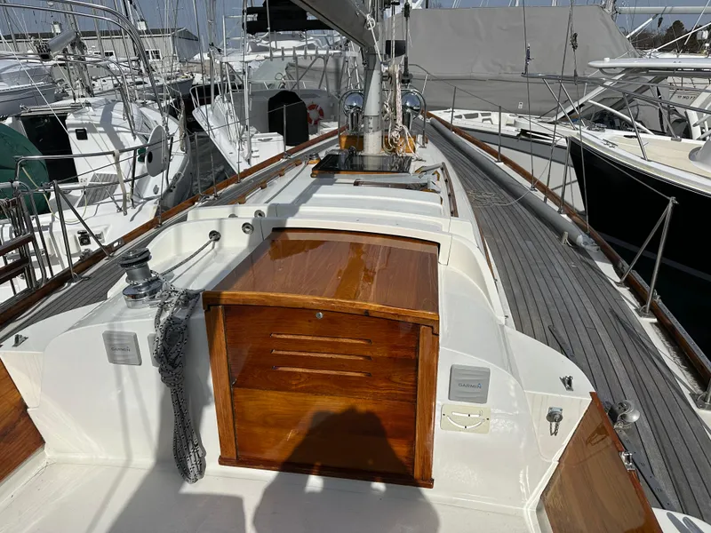 Slide: The Image of 1978 Hinckley Bermuda 40 MK III sailboat deck with wooden hatch and rigging. - 18