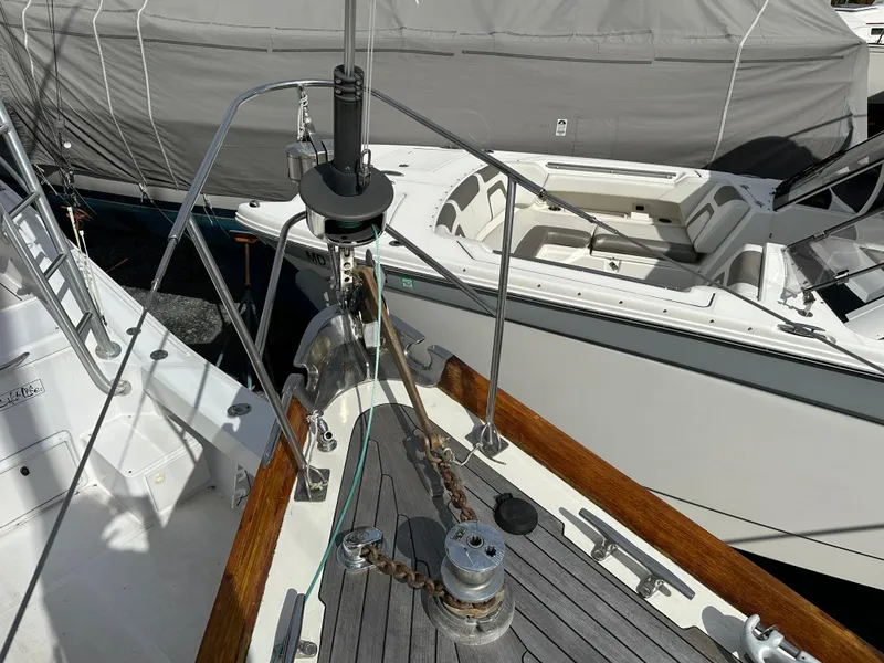 Slide: The Image of Bow of 1978 Hinckley Bermuda 40 MK III sailboat with anchor and winch. - 19