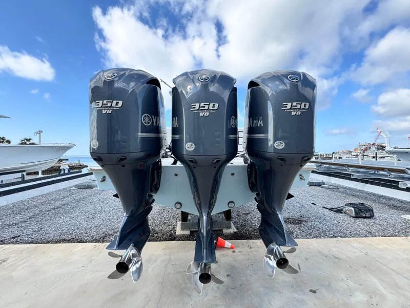 Slide: The Image of Triple Yamaha 350 V8 engines on a 2016 Invincible 39' Open Fisherman boat. - 4