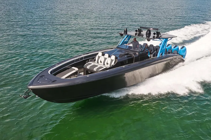 Slide: The Image of 2023 Midnight Express 43' Solstice boat cruising on open water. - 2