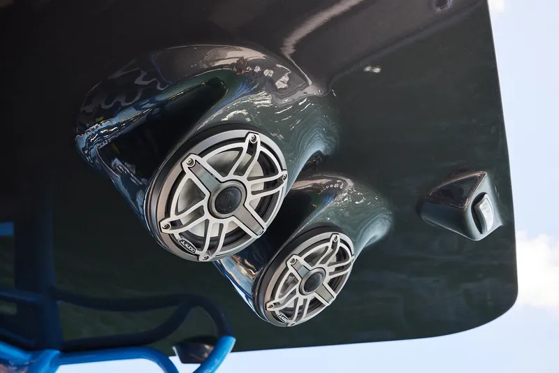 Slide: The Image of Close-up of 2023 Midnight Express 43' Solstice boat speakers and hull details. - 23