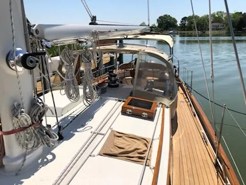 Slide: The Image of Cherubini Schooner 2000 on calm water, showcasing deck and rigging details. - 21