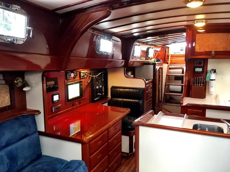 Slide: The Image of Luxurious interior of 2000 Cherubini Schooner with polished wood and modern navigation equipment. - 26
