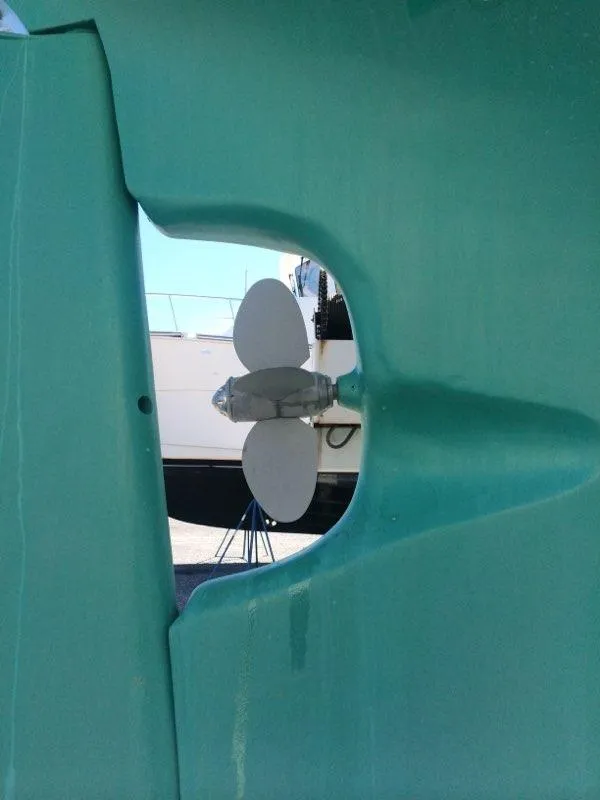 Slide: The Image of Propeller of 2000 Cherubini Schooner in dry dock, viewed through hull opening. - 36