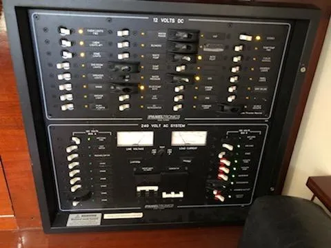 Slide: The Image of Electrical panel on a 2000 Cherubini Schooner, featuring 12V DC and 240V AC systems. - 38