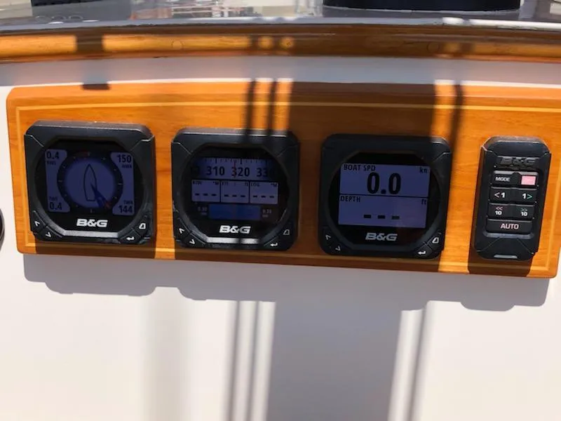 Slide: The Image of B&G navigation instruments on a 2000 Cherubini Schooner's wooden dashboard. - 41