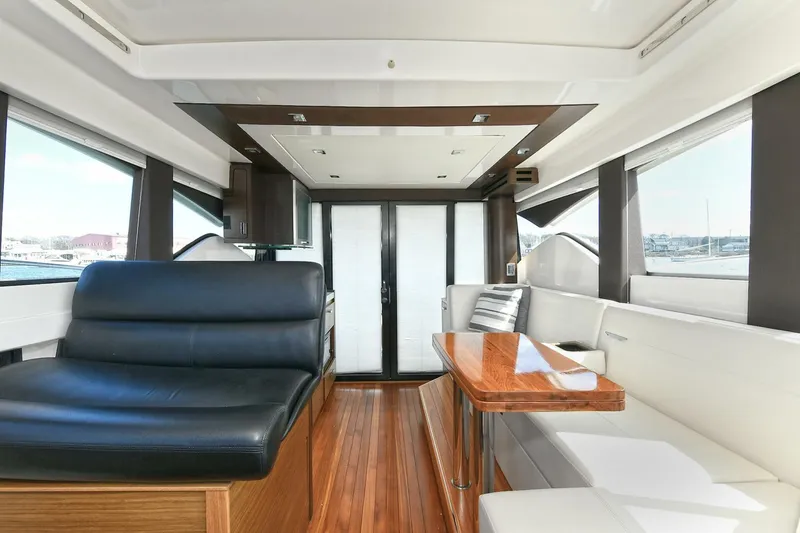 Slide: The Image of Interior of 2018 Tiara Yachts 39 Coupe, featuring sleek seating and modern design. - 19